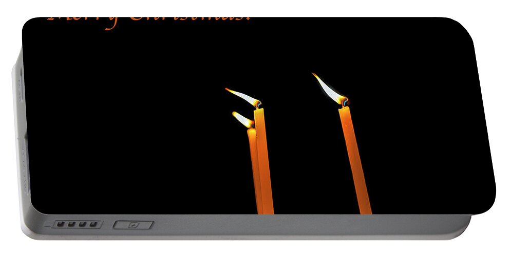 Holidays Portable Battery Charger featuring the photograph Three burning candles Merry Christmas by Patricia Hofmeester