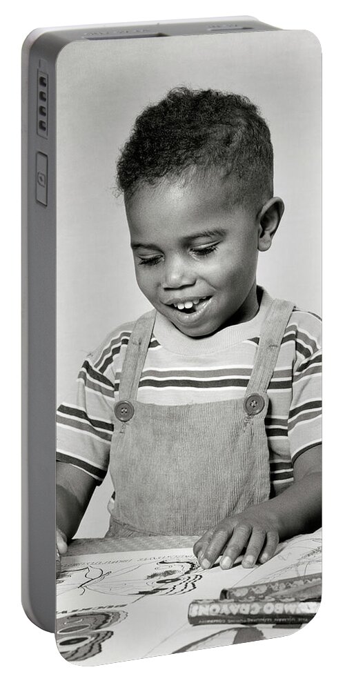 B&w Black And White 1940s 1950s African-american Black Ethnicity Black Boy Busy Cheerful Child Choice Coloring Crayons Creative Direction Discovery Drawing Excitement Expression Fat Fun Future Half-length Happy Home Life Humor Indoors Joy Juvenile Kid Laughing Lifestyle Male Person Pleased Portrait Pride Promise Recreation Single Sitting Smiling Strength Stylish Suburban Success Table Toddler Urban Wellness Working Retro Vintage Nostalgia Nostalgic Old Fashioned Old Fashion Old Time Classic Portable Battery Charger featuring the photograph 1940s 1950s creative smiling African-American boy toddler sitting at table working drawing by Panoramic Images