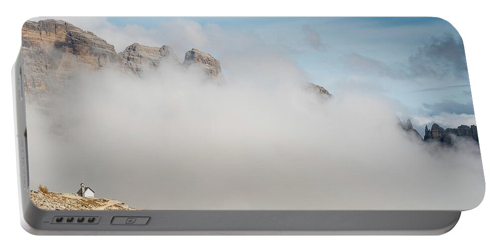 Tre Cime Portable Battery Charger featuring the photograph Mountain landscape with fog in autumn. Tre Cime dolomiti Italy. by Michalakis Ppalis