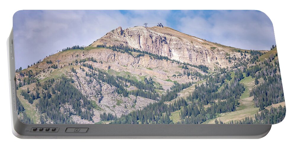 Rocky Mountains Montana Portable Battery Charger featuring the photograph welcome to big sky montana village in montana USA in summer #2 by Alex Grichenko