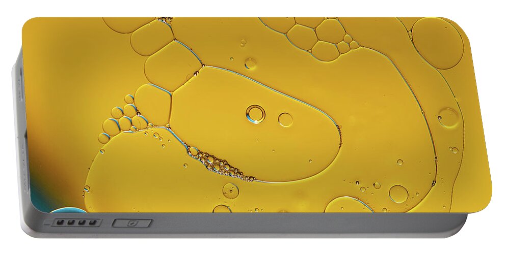 Yellow Portable Battery Charger featuring the photograph Yellow bubbles and figures by Michalakis Ppalis