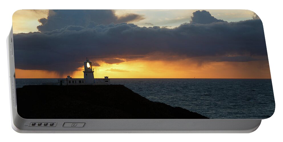 Lighthouse Portable Battery Charger featuring the photograph Sunset at Strumble Head Lighthouse #5 by Ian Middleton