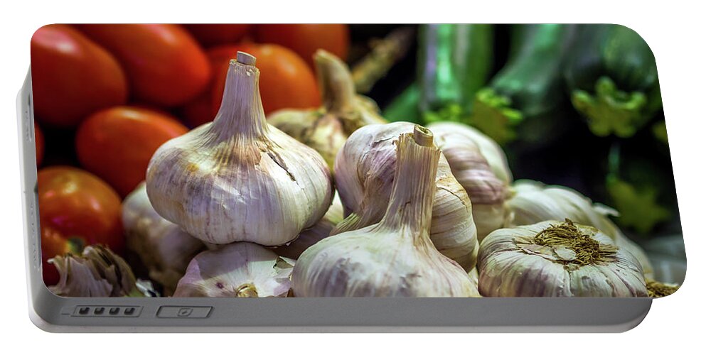 Fruit Portable Battery Charger featuring the photograph A Bunch of Garlic by Luis Vasconcelos