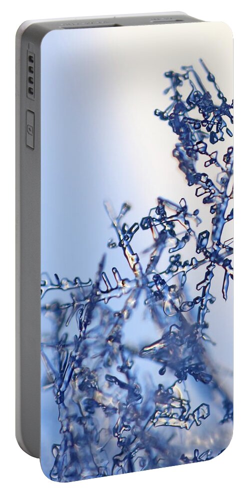 Abstract Portable Battery Charger featuring the photograph A fragile tangle of snowflakes by Ulrich Kunst And Bettina Scheidulin