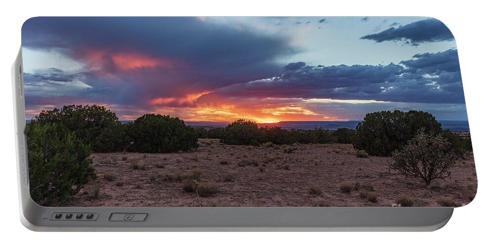 Landscape Portable Battery Charger featuring the photograph A Hole in the Clouds by Seth Betterly