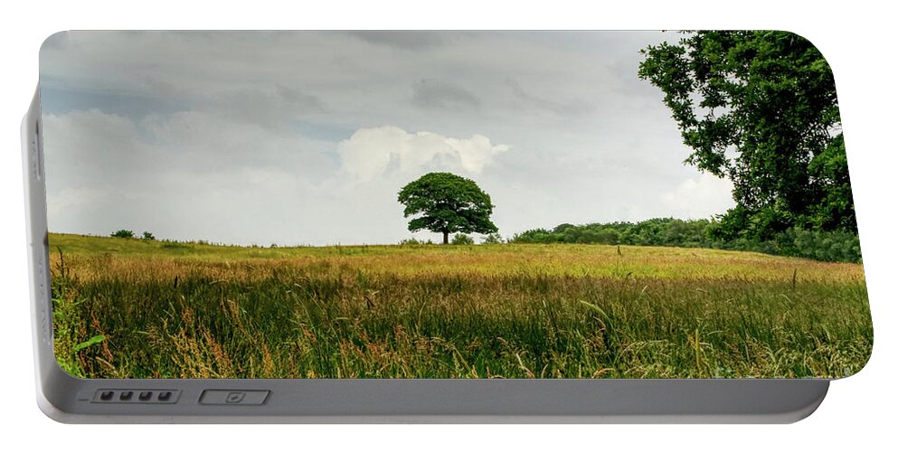 Digital Art Portable Battery Charger featuring the photograph A single lone tree on a hill in the Hopwood Woods Nature Reserve 2021. by Pics By Tony
