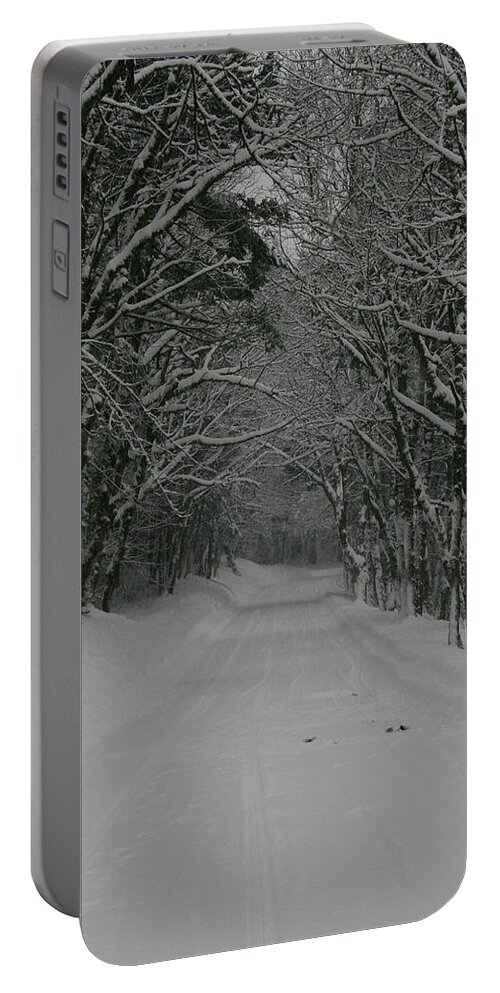 Snow Portable Battery Charger featuring the photograph A Snowy Road Less Travelled by Leslie Struxness
