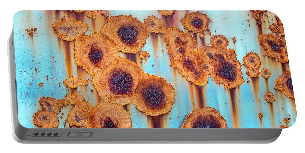 Abstract Portable Battery Charger featuring the photograph Abstract of blue painted metal surface by Karen Foley