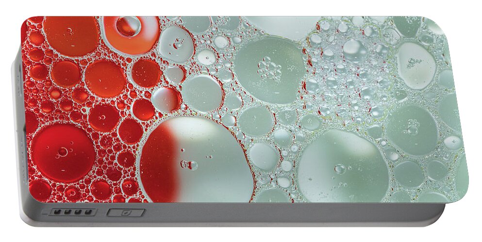 Abstract Photography Portable Battery Charger featuring the photograph Abstract Photography - Red and Green by Amelia Pearn