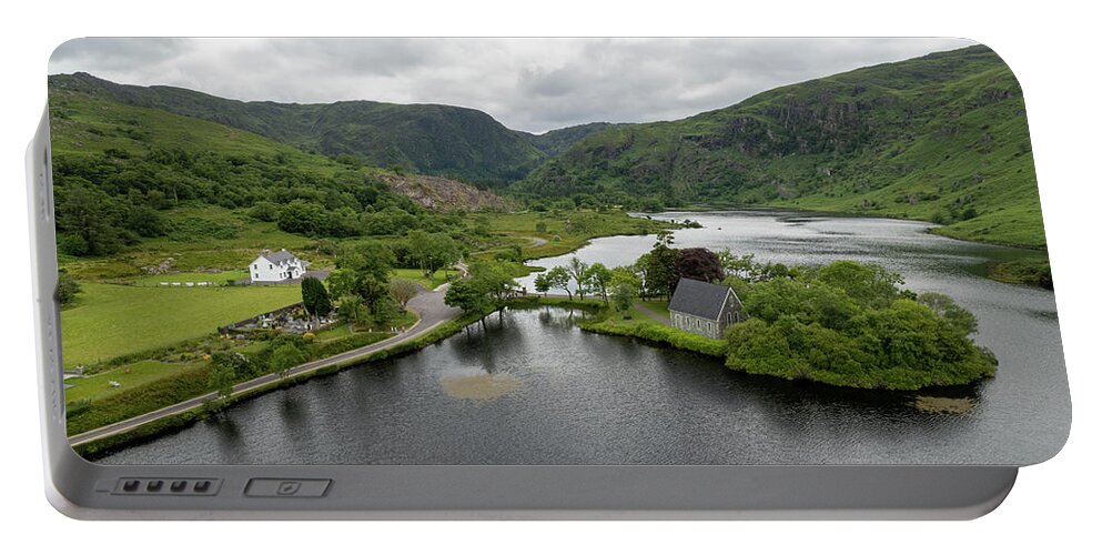 Saint Finbarr Oratory Portable Battery Charger featuring the photograph Aerial drone landscape of St. Finbarr oratory Church, Gougane Barra, cork West Ireland. by Michalakis Ppalis