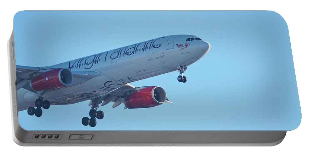 Airplane Portable Battery Charger featuring the photograph Airbus A330 by Paul Freidlund