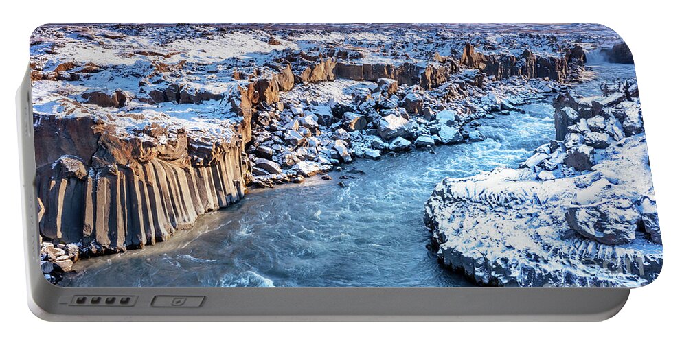Adventure Portable Battery Charger featuring the photograph Aldeyjarfoss waterfall, aerial drone shot taken from a high angl by Jane Rix
