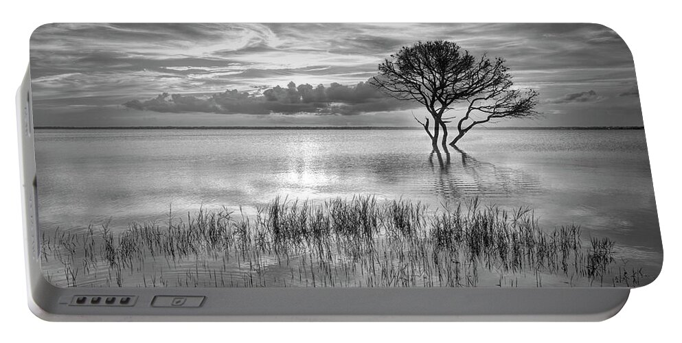 Clouds Portable Battery Charger featuring the photograph Alone at Sunset in Black and White by Debra and Dave Vanderlaan