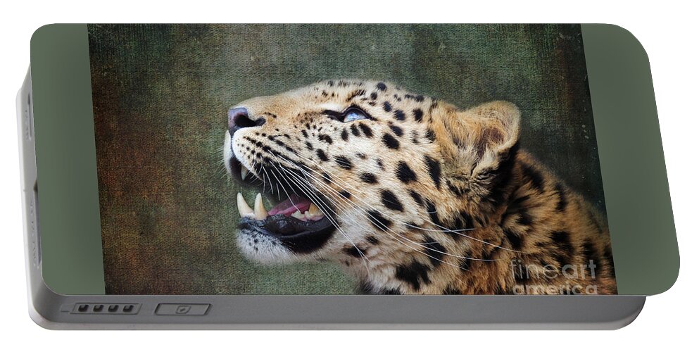 Leopard Portable Battery Charger featuring the photograph Amur leopard looking up. iIndigenous to southeastern Russia and northeast China, and listed as Critically Endangered. Processed to look like an old painting. by Jane Rix