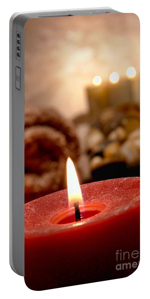 Ambience Portable Battery Charger featuring the photograph Aromatherapy Candle Burning in a Spa by Olivier Le Queinec