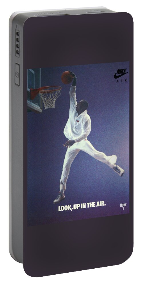 Ad Portable Battery Charger featuring the mixed media 1987 Nike Jordan Up In The Air Ad by Row One Brand