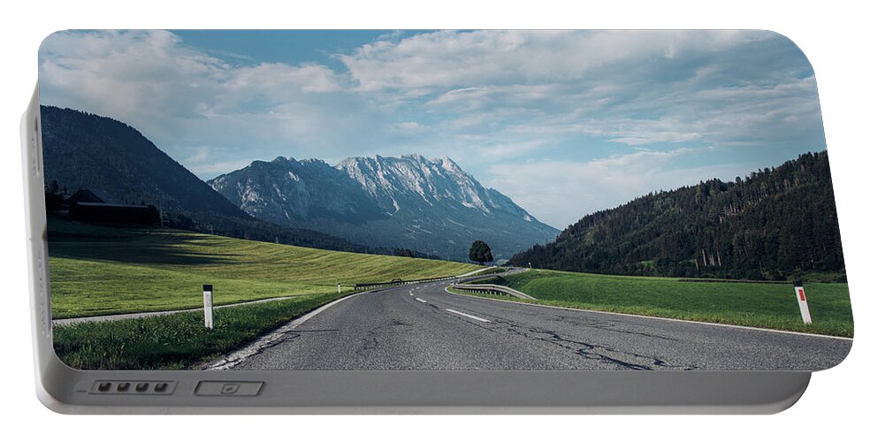 Overcast Portable Battery Charger featuring the photograph Asphalt road in Schladming by Vaclav Sonnek