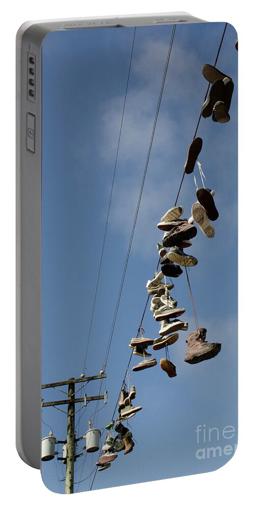 Shoe Portable Battery Charger featuring the photograph At The End Of The Line by Bob Christopher