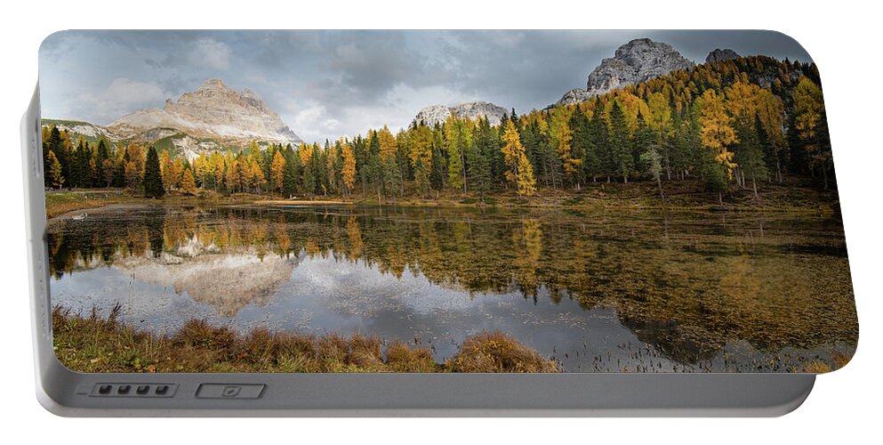 Antorno Lake Portable Battery Charger featuring the photograph Lake antorno in autumn Italian dolomiti by Michalakis Ppalis