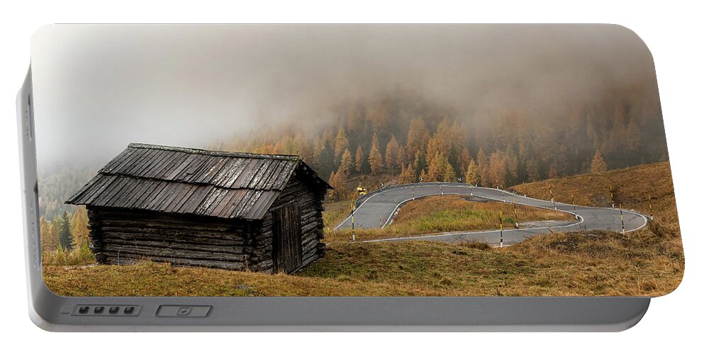Passo Gardena Portable Battery Charger featuring the photograph Autumn landscape with wooden chalet dolomiti Italian Apls by Michalakis Ppalis