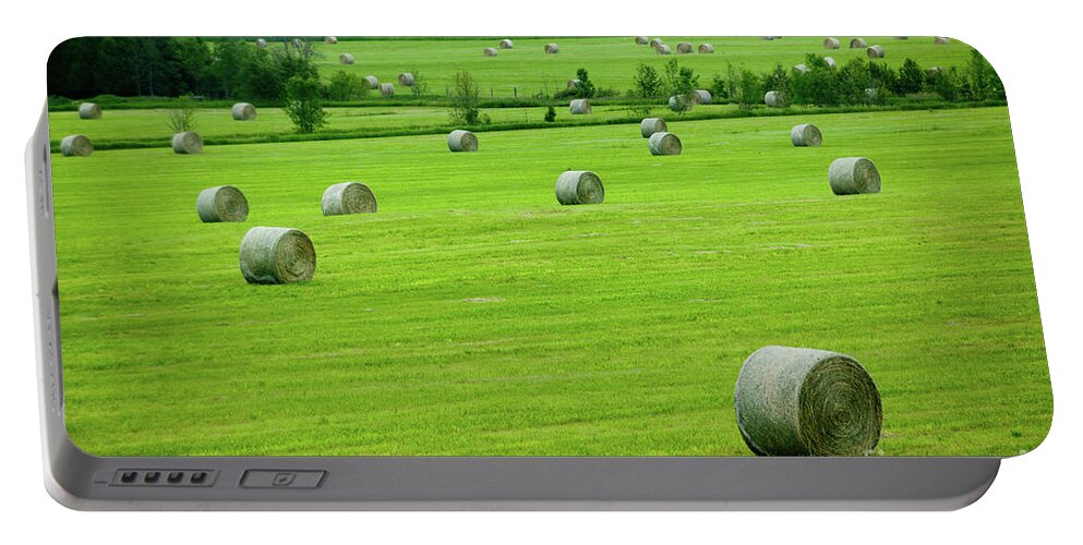 Bales Portable Battery Charger featuring the photograph Bales of Hay in the Field by Rich S