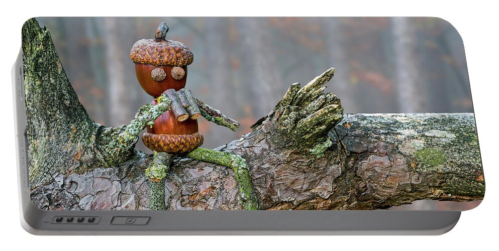 Figure Portable Battery Charger featuring the photograph Birdwatcher Sitting on Branch by Arterra Picture Library