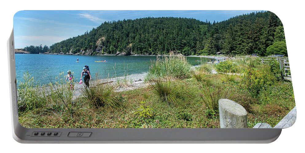 Bowman Bay Beach Walkers Portable Battery Charger featuring the photograph Bowman Bay Beach Walkers by Tom Cochran