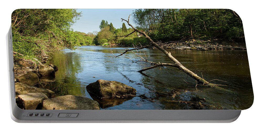 Branch Portable Battery Charger featuring the photograph Branch in the river by Average Images