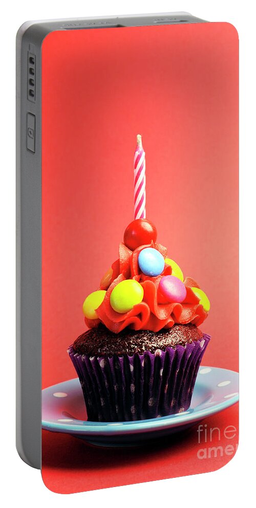 Childrens Portable Battery Charger featuring the photograph Candy covered chocolate cupcake by Milleflore Images