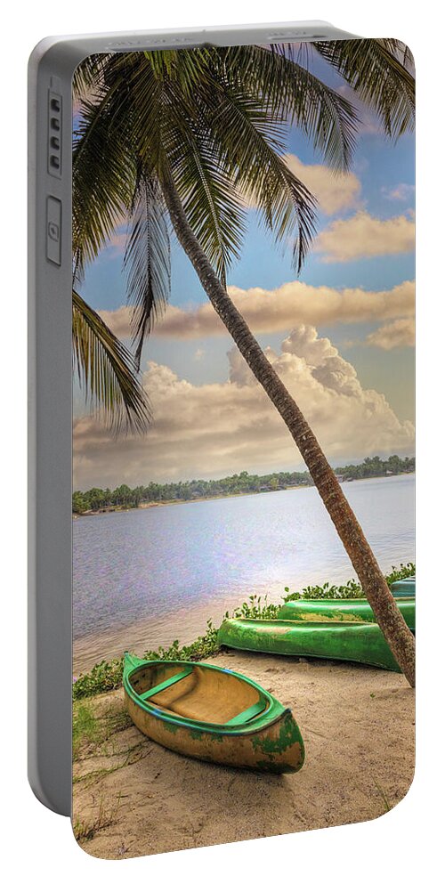 African Portable Battery Charger featuring the photograph Canoes Waiting on the Beach by Debra and Dave Vanderlaan