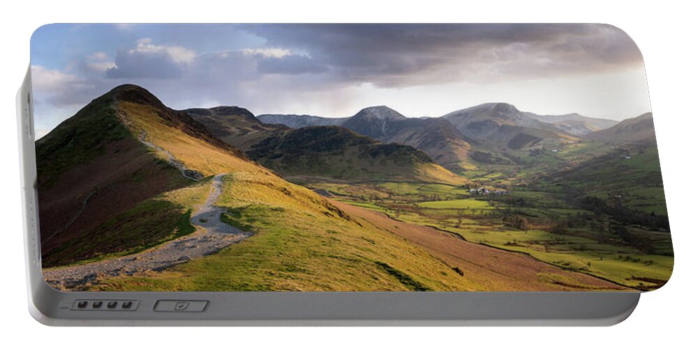 Panorama Portable Battery Charger featuring the photograph Catbells Hiking trail in the Lake District England by Sonny Ryse