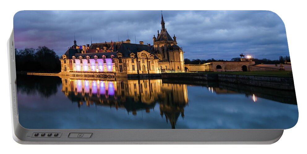 Ancient Portable Battery Charger featuring the photograph Chantilly castle at night by Jean-Luc Farges