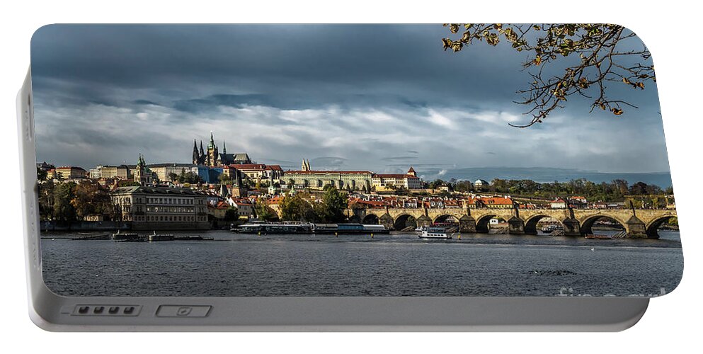 Prague Portable Battery Charger featuring the photograph Charles Bridge Over Moldova River And Hradcany Castle In Prague In The Czech Republic by Andreas Berthold