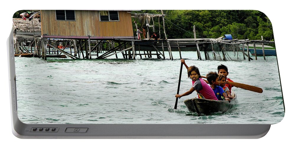 Sea Portable Battery Charger featuring the photograph Children Of The Reef - Sea Gypsy Village, Sabah. Malaysian Borneo by Earth And Spirit