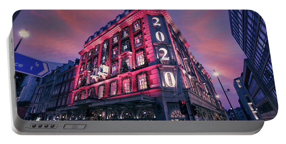 Sunset Portable Battery Charger featuring the photograph Christmas at Fortnum and Mason 2020 by Andrew Lalchan