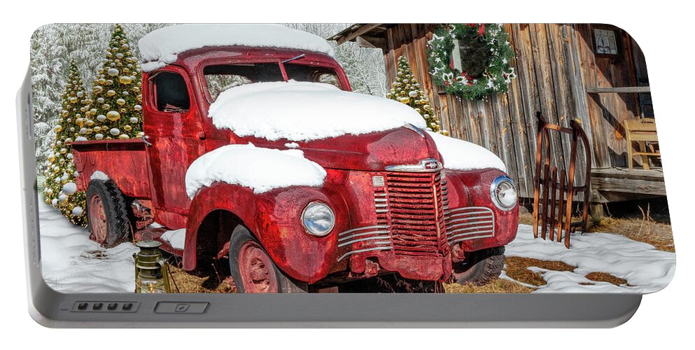 Truck Portable Battery Charger featuring the photograph Christmas Rust in the Snow by Debra and Dave Vanderlaan