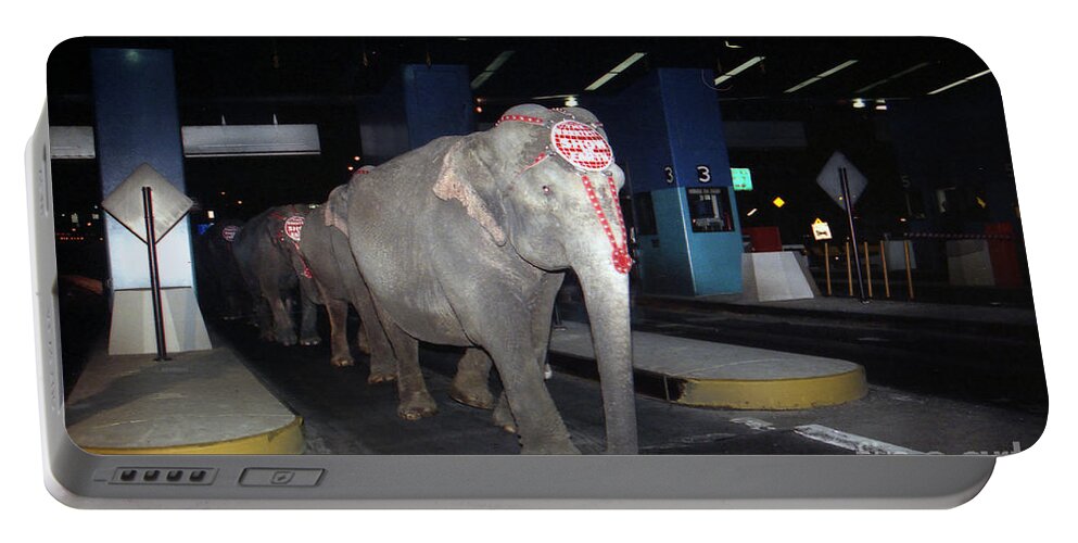 Circus Portable Battery Charger featuring the photograph Circus elephants marching through the Queens Midtown Tunnel by Steven Spak
