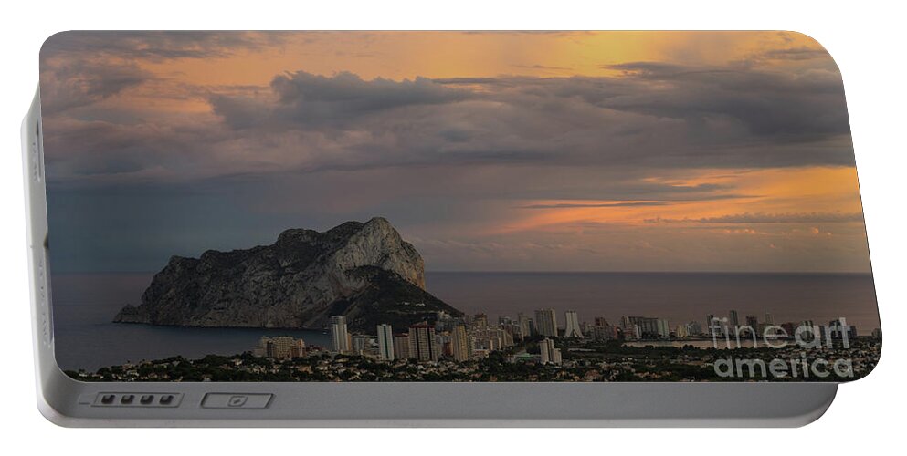 Sunset Portable Battery Charger featuring the photograph Clouds on the Mediterranean coast in Calpe by Adriana Mueller