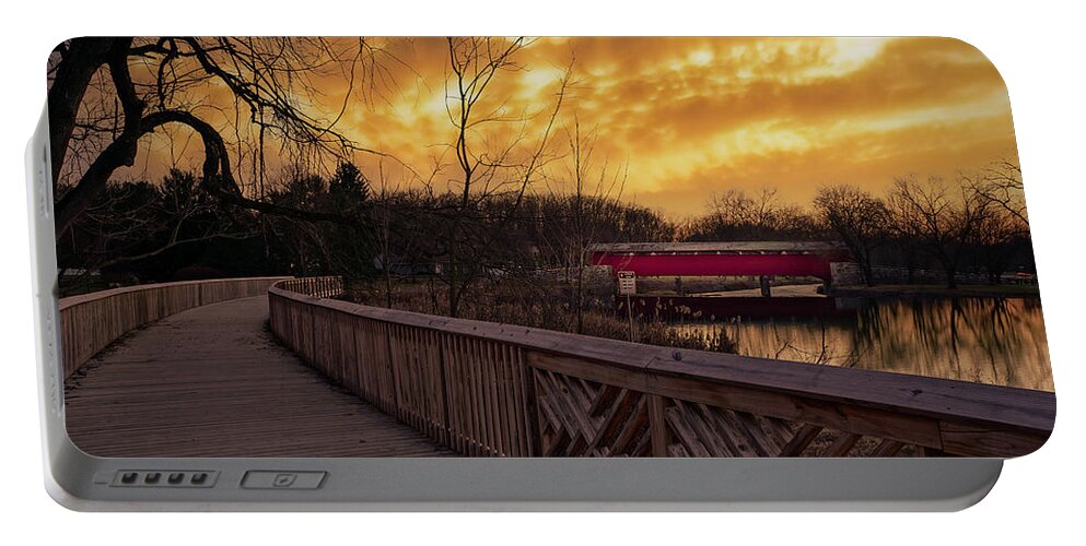 Covered Portable Battery Charger featuring the photograph Covered Bridge Park Under Brooding Skies by Jason Fink