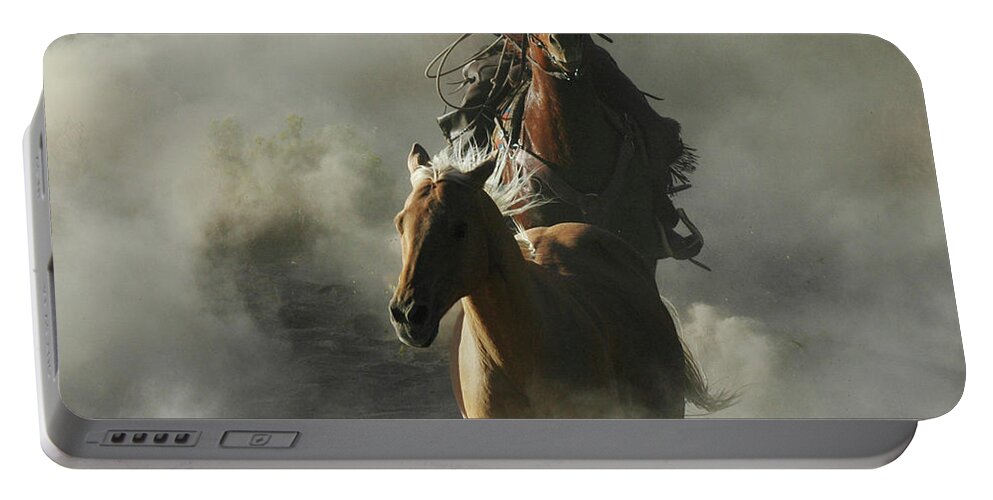 Cowboy Portable Battery Charger featuring the photograph Cowboy Roping Horses by Jody Miller