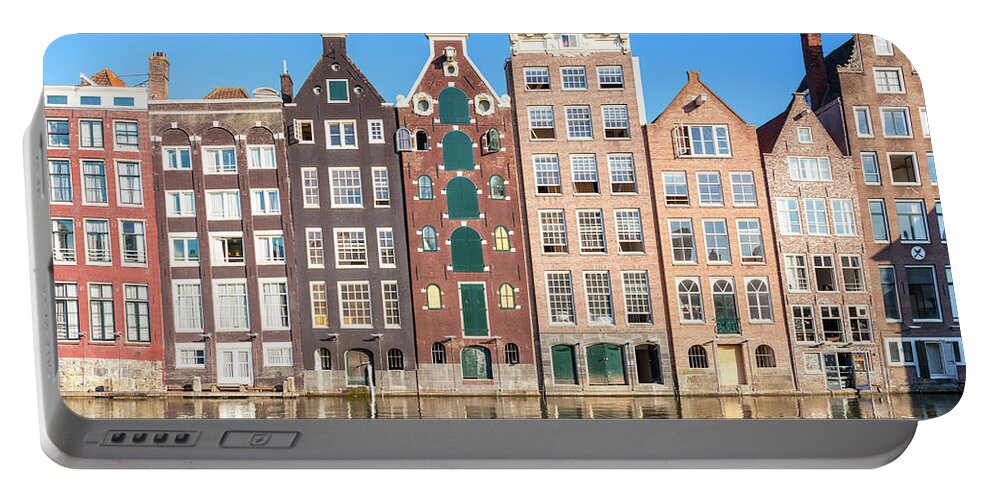 Amsterdam Portable Battery Charger featuring the photograph Damrak houses, Amsterdam by Neale And Judith Clark