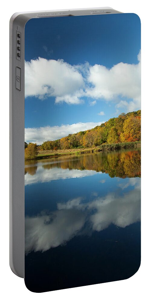 Fall Portable Battery Charger featuring the photograph Dancing Clouds by Karol Livote