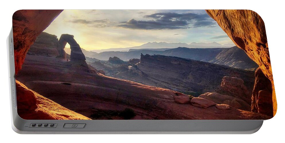 Delicate Arch Portable Battery Charger featuring the photograph Delicate Arch Sunrise Through a Window by Bradley Morris