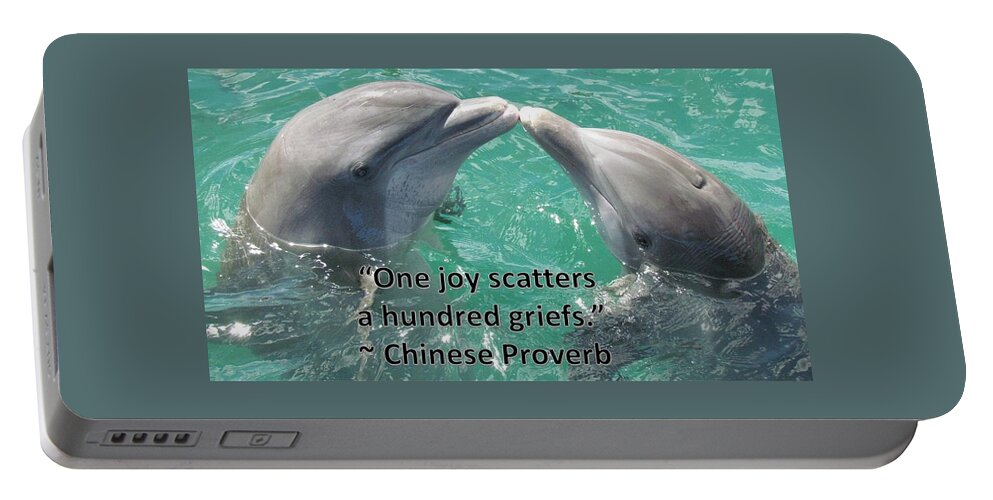 Dolphins Portable Battery Charger featuring the photograph Dolphins Bring Joy by Nancy Ayanna Wyatt