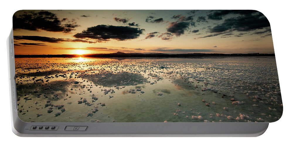Sunset Portable Battery Charger featuring the photograph Dramatic winter sunset in the lake. by Michalakis Ppalis