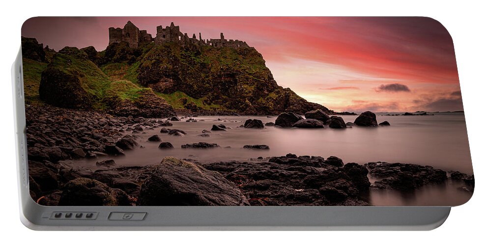 Dunluce Portable Battery Charger featuring the photograph Dunluce Castle Sunset by Nigel R Bell