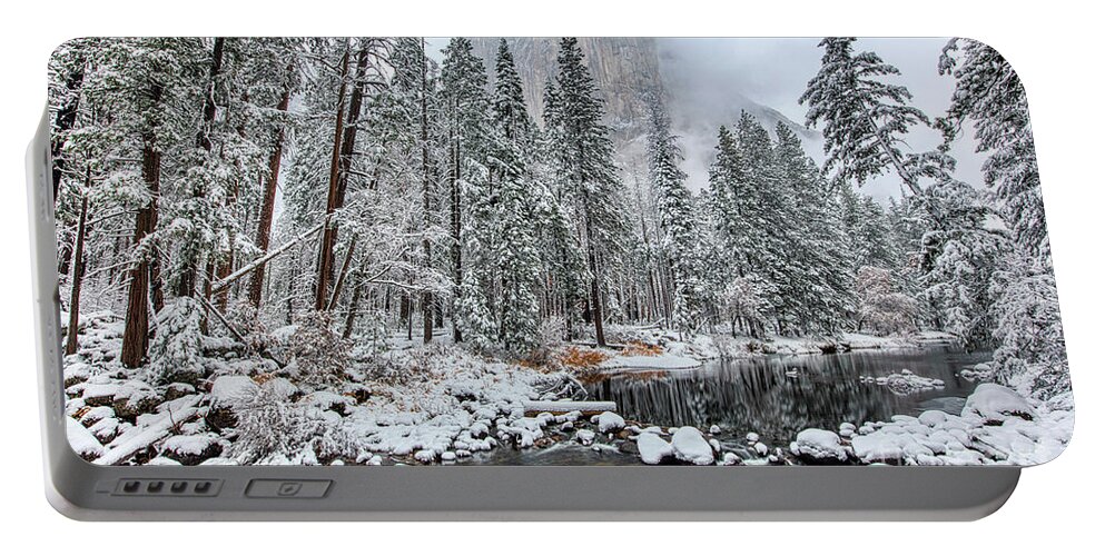 El Capitan And The Merced River Snow In Yosemite National Park Portable Battery Charger featuring the photograph El Capitan and The Merced River with Snow in Yosemite National Park by Dustin K Ryan