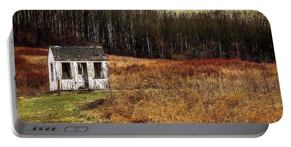 White Abandoned Cabin Portable Battery Charger featuring the photograph Abandoned White Cabin by Reynaldo Williams