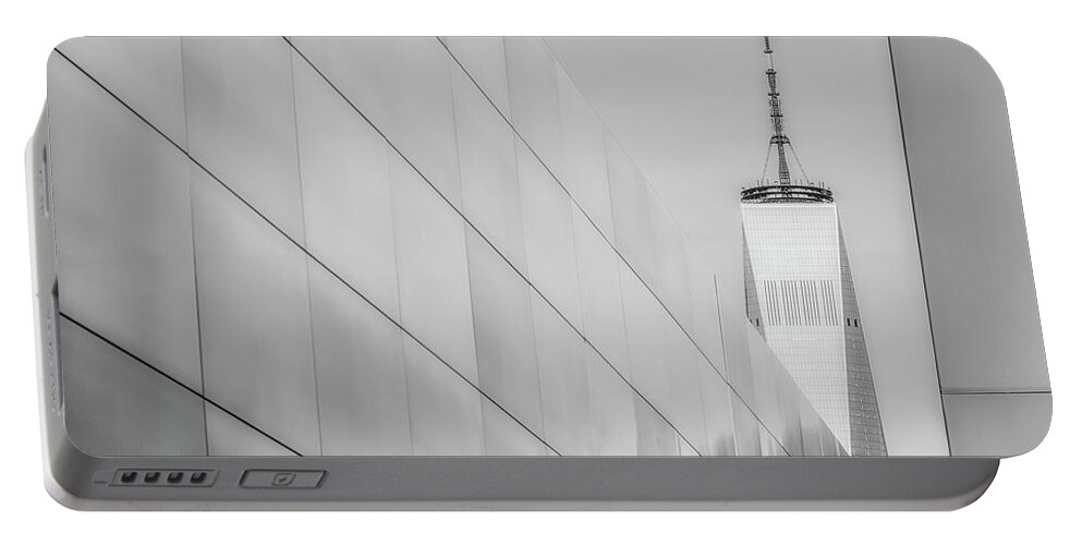 Wtc Portable Battery Charger featuring the photograph Empty Sky And WTC BW by Susan Candelario