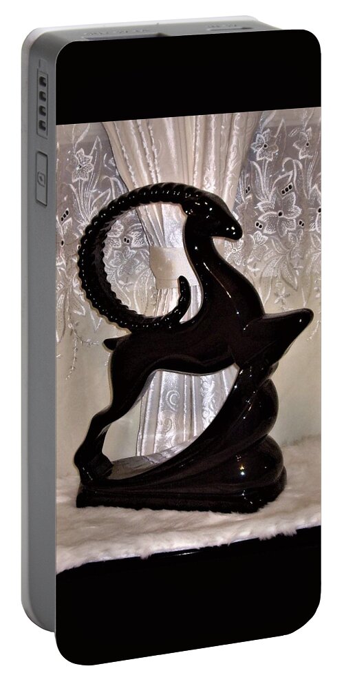 Animal Portable Battery Charger featuring the photograph Exotic Animal Figurine by Nancy Ayanna Wyatt